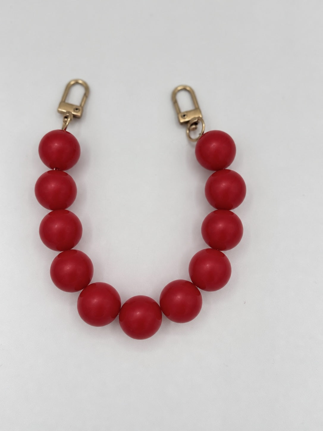 Red Bubblegum Stadium + Phone Bag Chains
